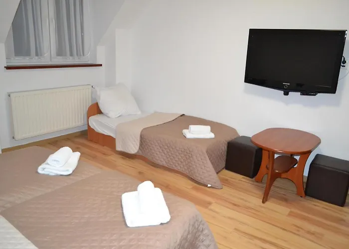 Pod Skarpa אורחן *